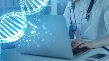 Person in lab coat working on laptop with DNA strand overlay.