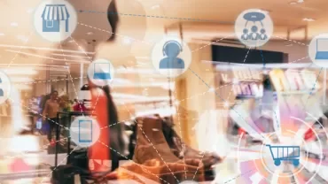 Digital retail concept with shopping icons over a store interior.