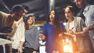 Group of people collaborating in a modern office.